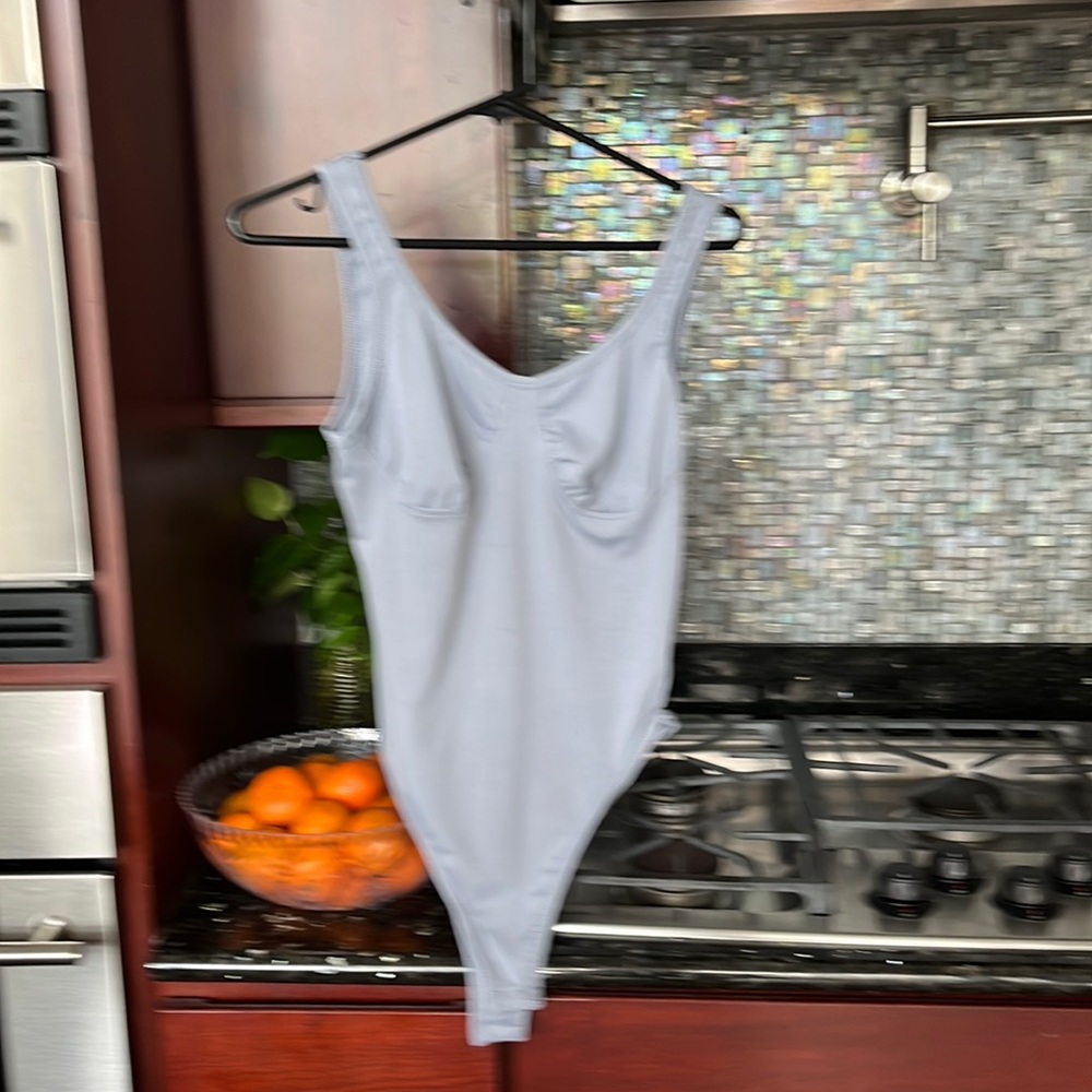 Gray size M bodysuit never worn.